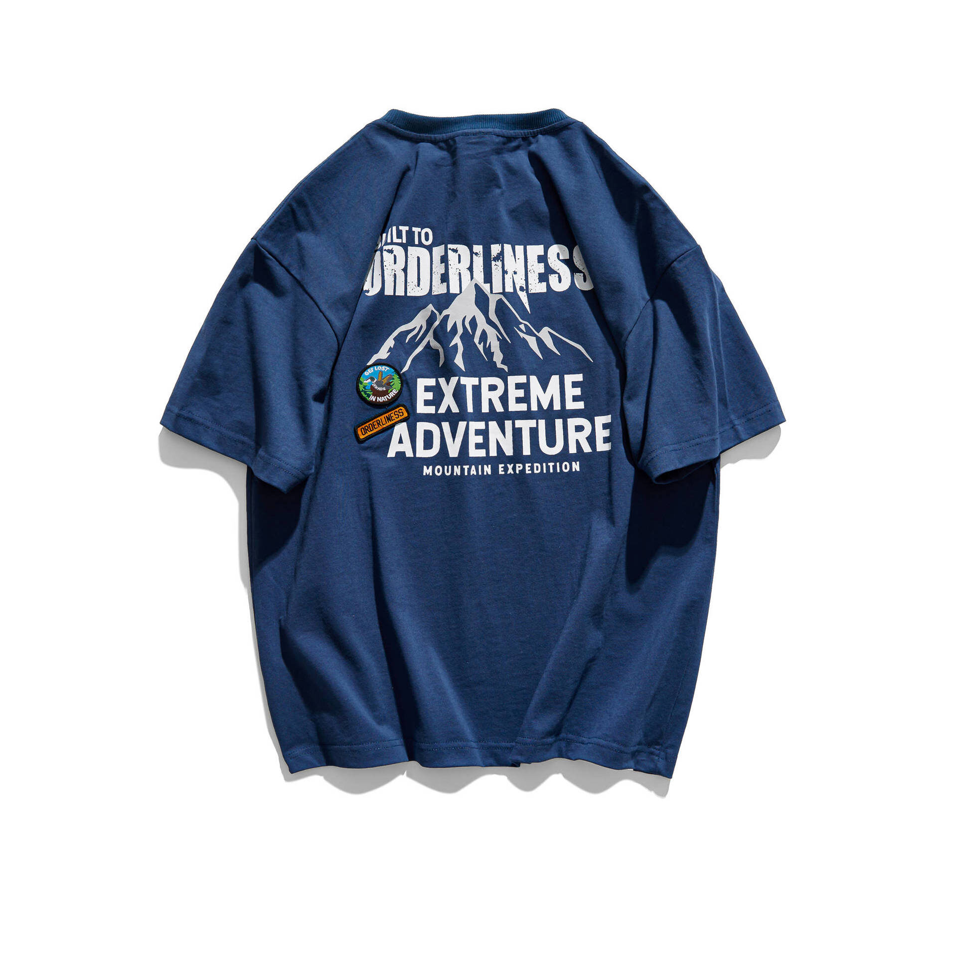 Футболка «EXTREME ADVENTURE»: вільний крій, комфортна бавовняна тканина, стильний принт гір на спині та надпис «EXTREME ADVENTURE».