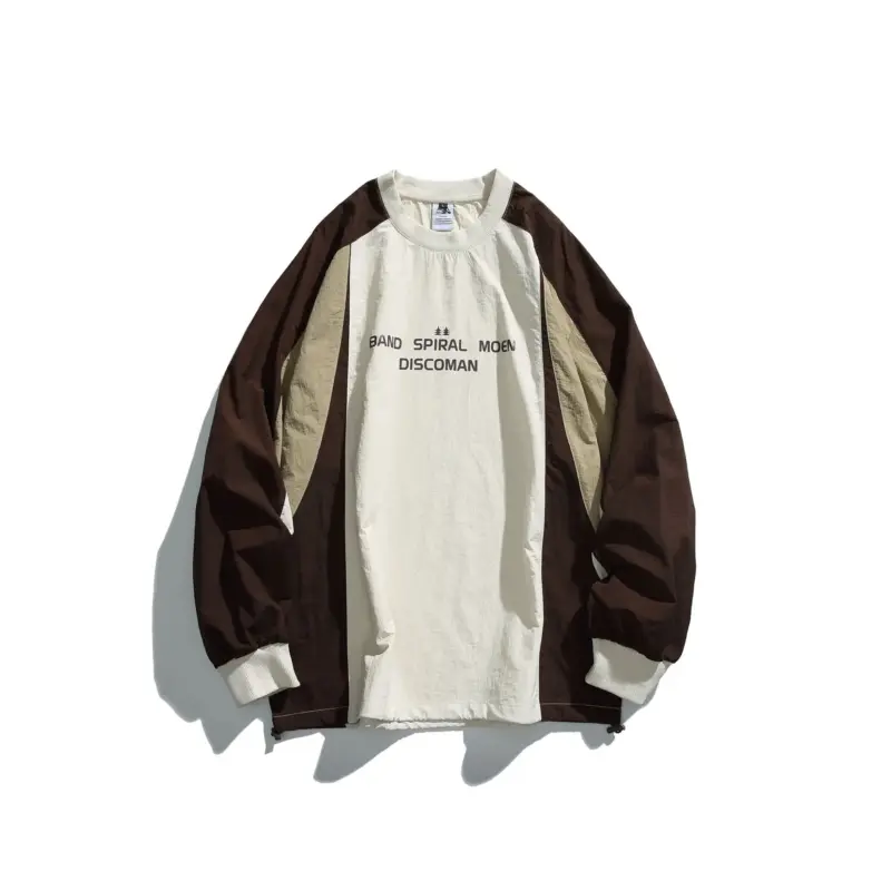 Світшот "BAND" з контрастними вставками в різних кольорах.