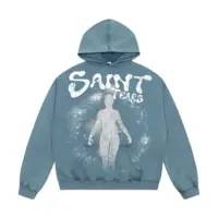 Худі «SAINT TEARS» у чорному та світло-синьому кольорах із великим графічним принтом на спині.