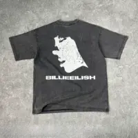 Чорна футболка oversize із принтом Billie Eilish і графічними елементами.