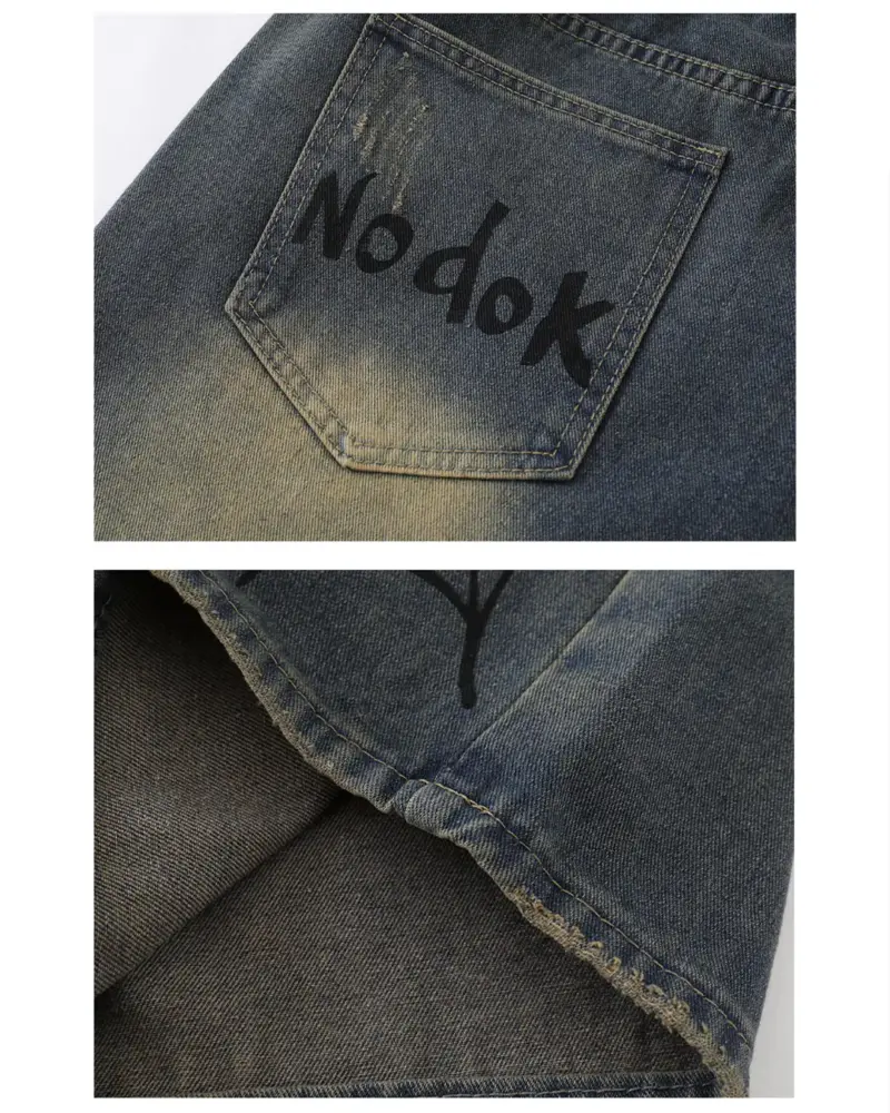 Джинсові шорти «NODOK» із washed-ефектом та графічним принтом павука і павутини у стилі streetwear.